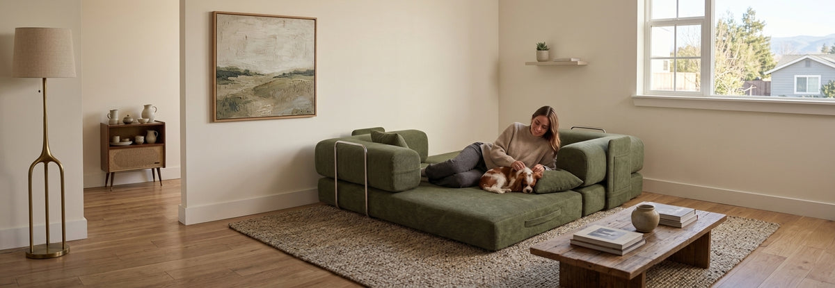 Olive green sofa bed in a living room