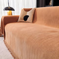 Chenille caramel orange sofa throw, 180 x 300 cm, draped over a sofa