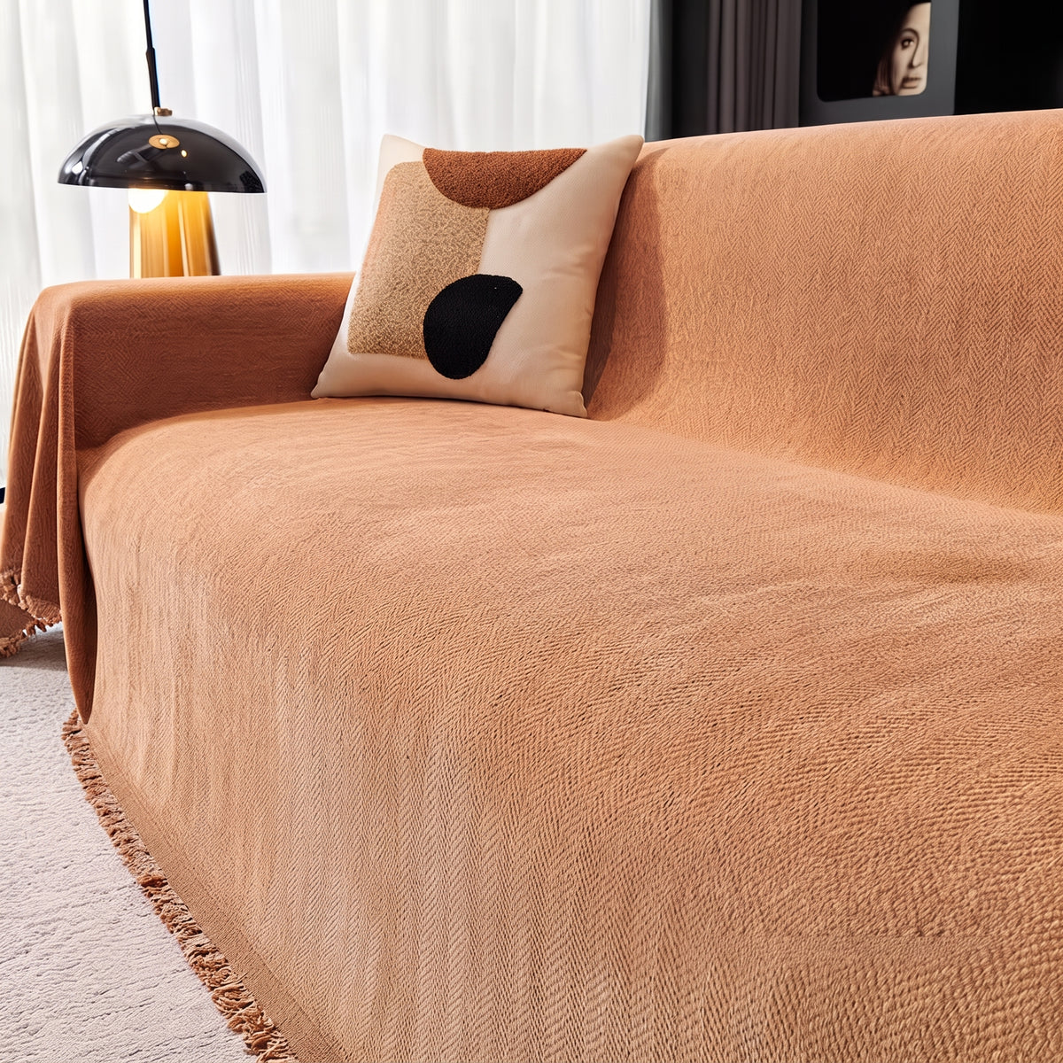 Chenille caramel orange sofa throw, 180 x 300 cm, draped over a sofa