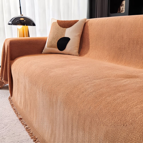 Chenille caramel orange sofa throw, 180 x 300 cm, draped over a sofa