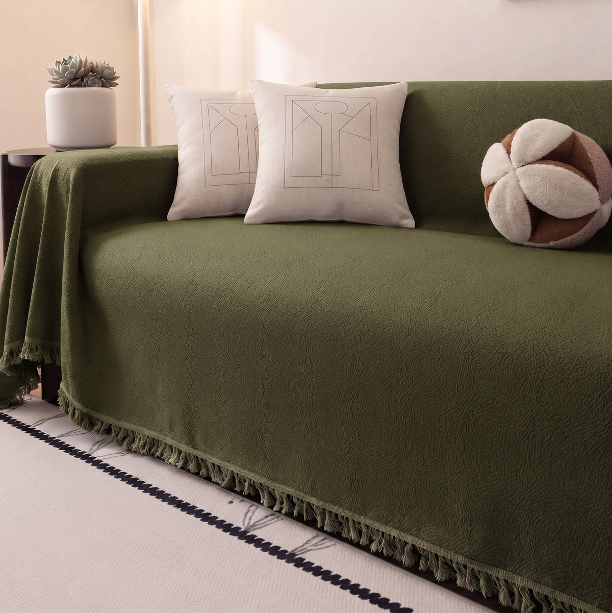 Velvet green sofa throw, 180 x 300 cm, draped over a sofa