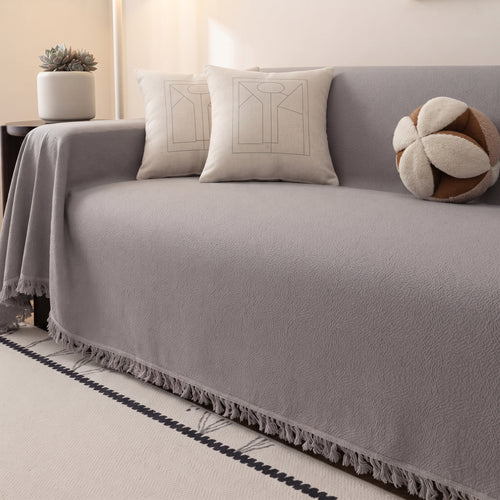 Velvet grey sofa throw, 180 x 300 cm, draped over a sofa